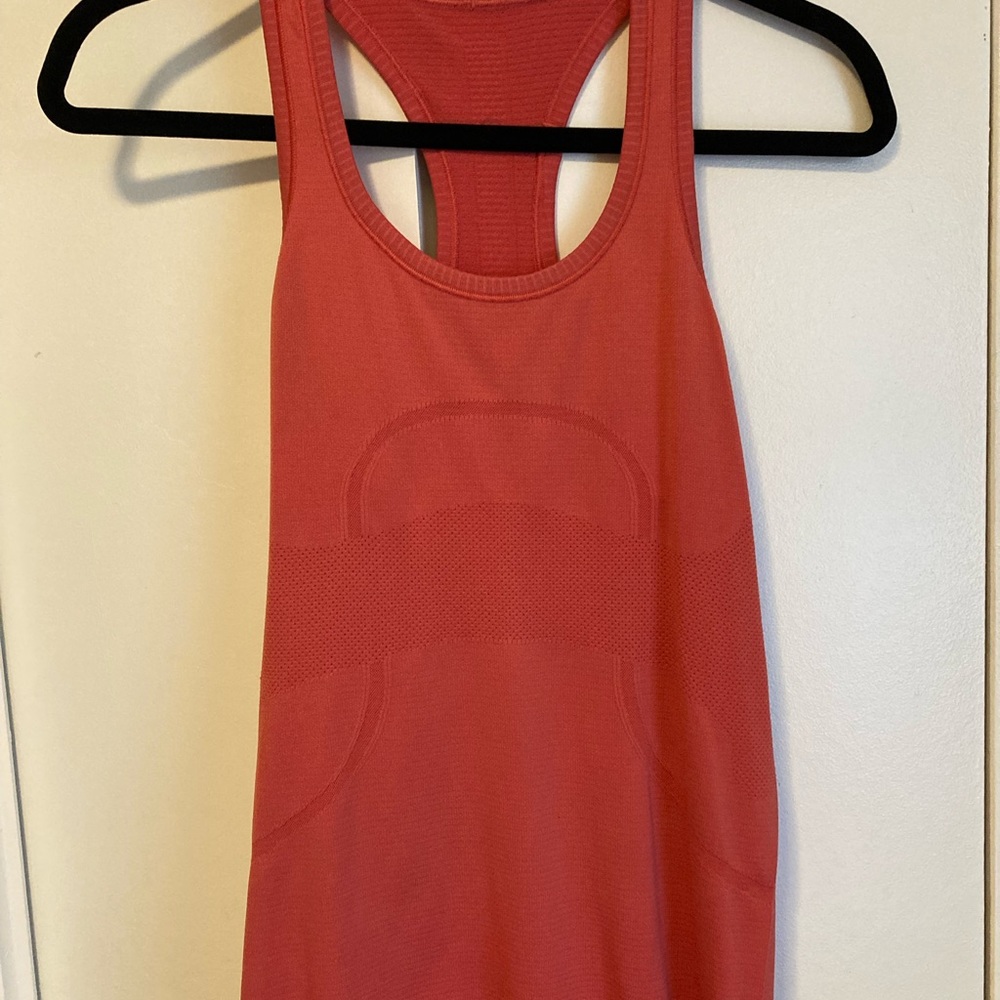 Women’s lululemon swiftlytech racer back tank top. Heathered grapefruit.